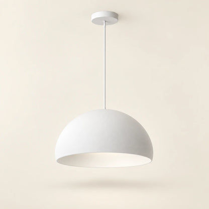 White soft dome pendant light on a warm studio background