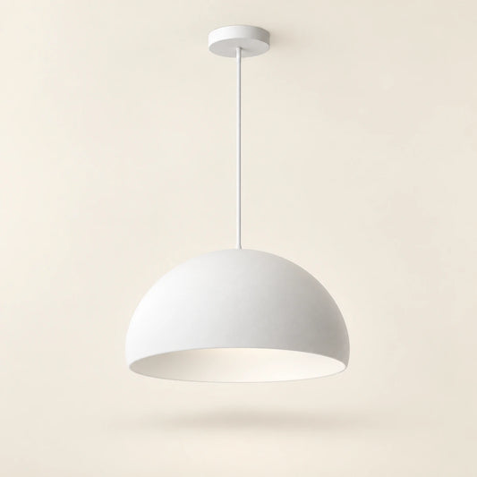 White soft dome pendant light on a warm studio background