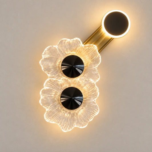 Floral halo illuminated wall art on a warm studio wall