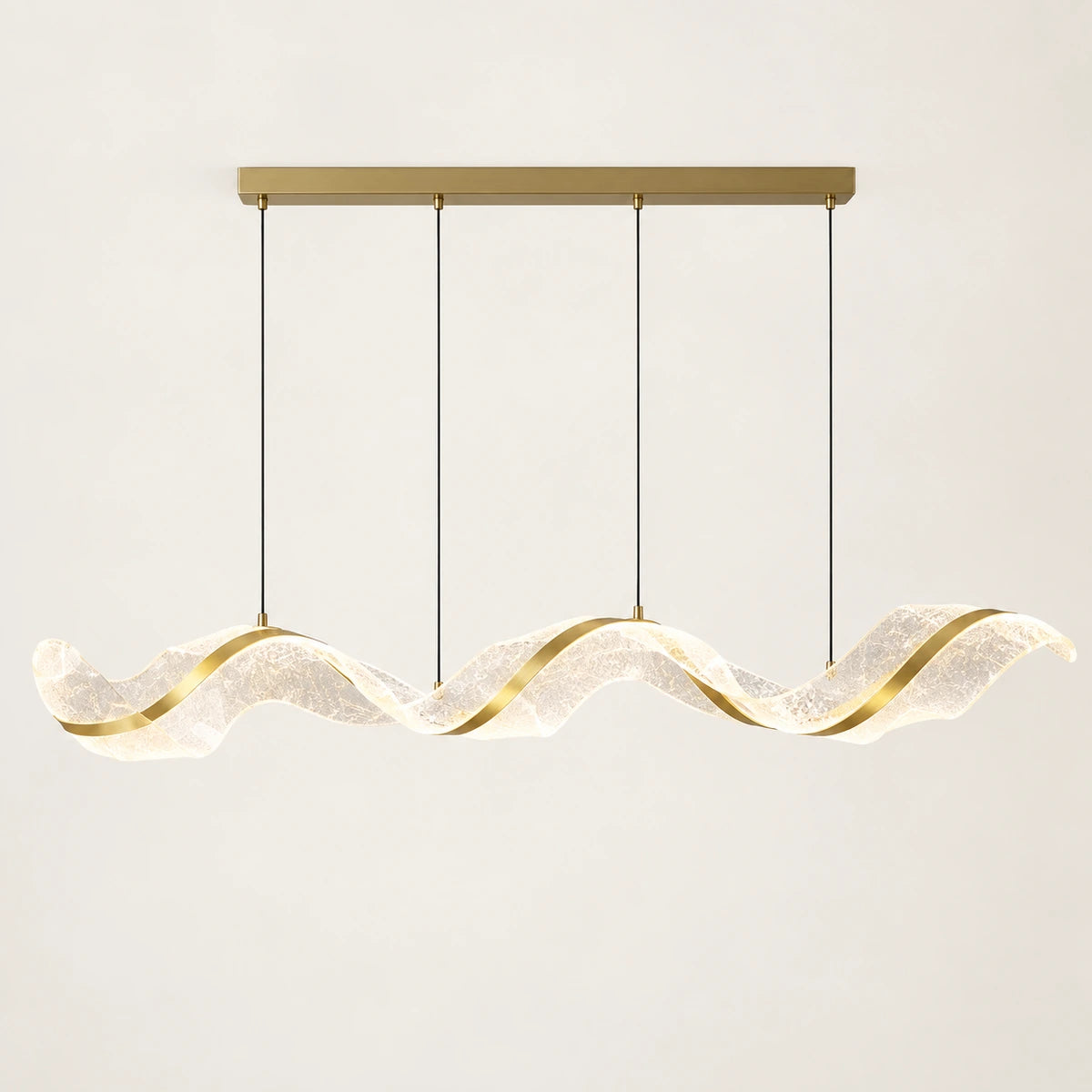 Sculptural wave LED chandelier on a warm studio background