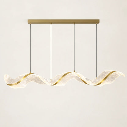 Sculptural wave LED chandelier on a warm studio background