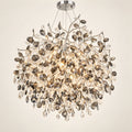 Silver botanical crystal chandelier on a warm studio background