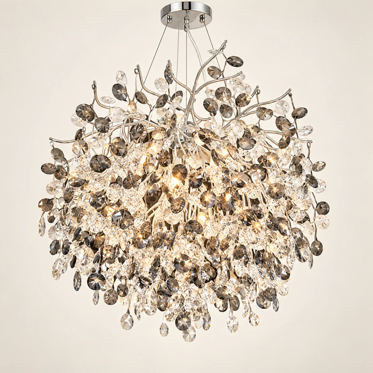 Silver botanical crystal chandelier on a warm studio background