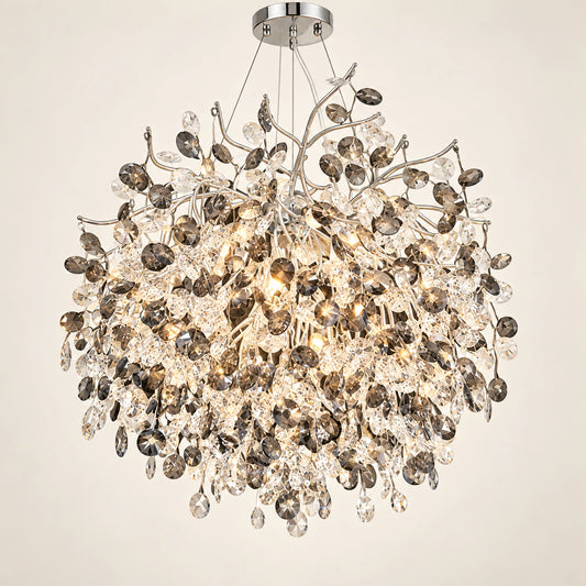 Silver botanical crystal chandelier on a warm studio background