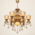 Amber crystal six-light chandelier on a warm studio background