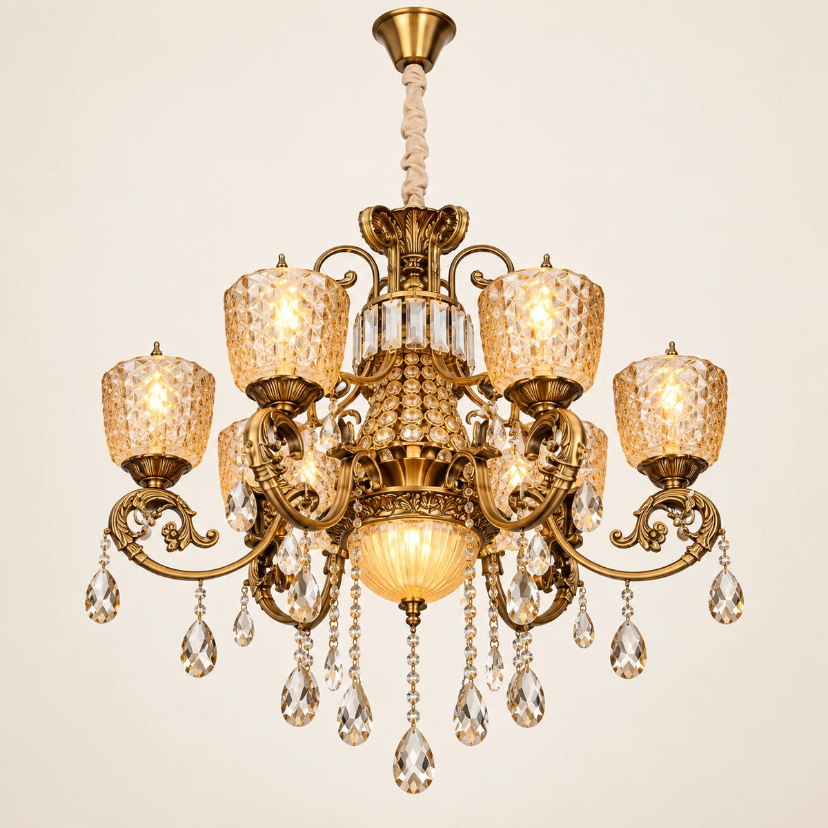 Amber crystal six-light chandelier on a warm studio background