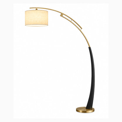 Arc floor lamp with drum shade on a clean studio background