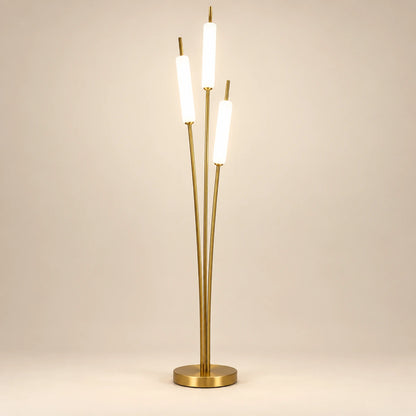 Gold-tone floor lamp with three staggered glowing white tubes