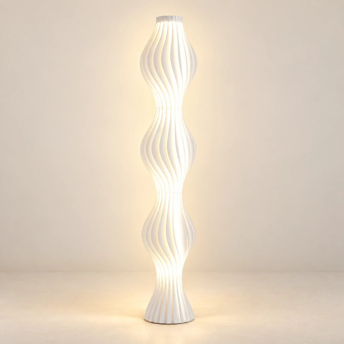 White three-wave ribbed sculptural LED floor lamp