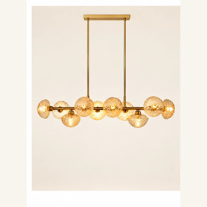 Gold and amber globe linear chandelier