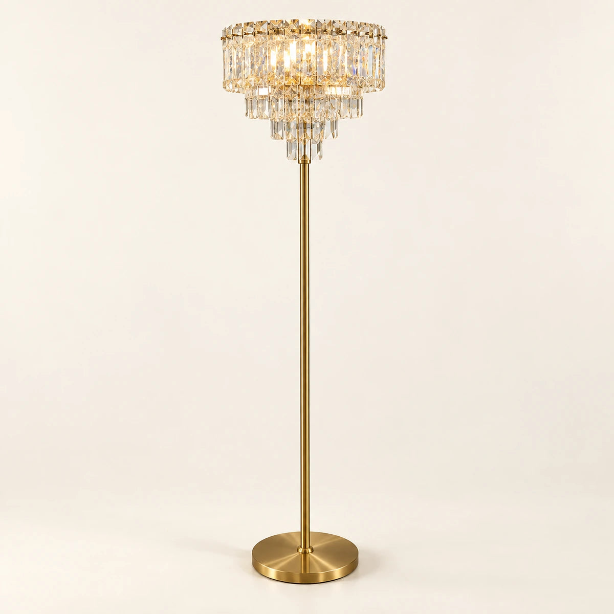 Gold-tone floor lamp with a tiered clear faceted-accent head