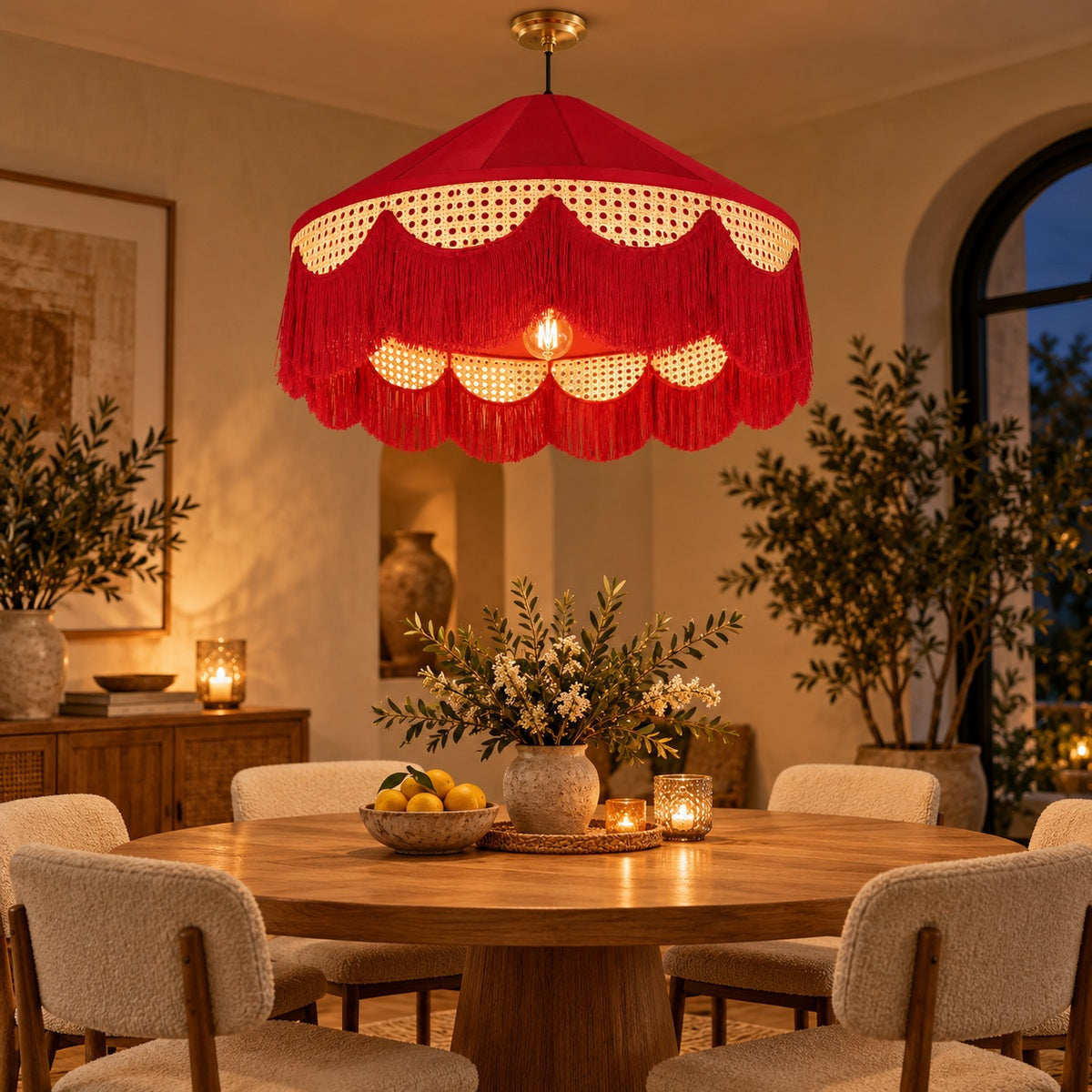 Deep-red cane fringe pendant above a round dining table
