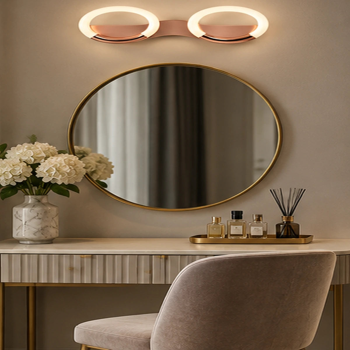 Oval-ring wall light above a dressing mirror