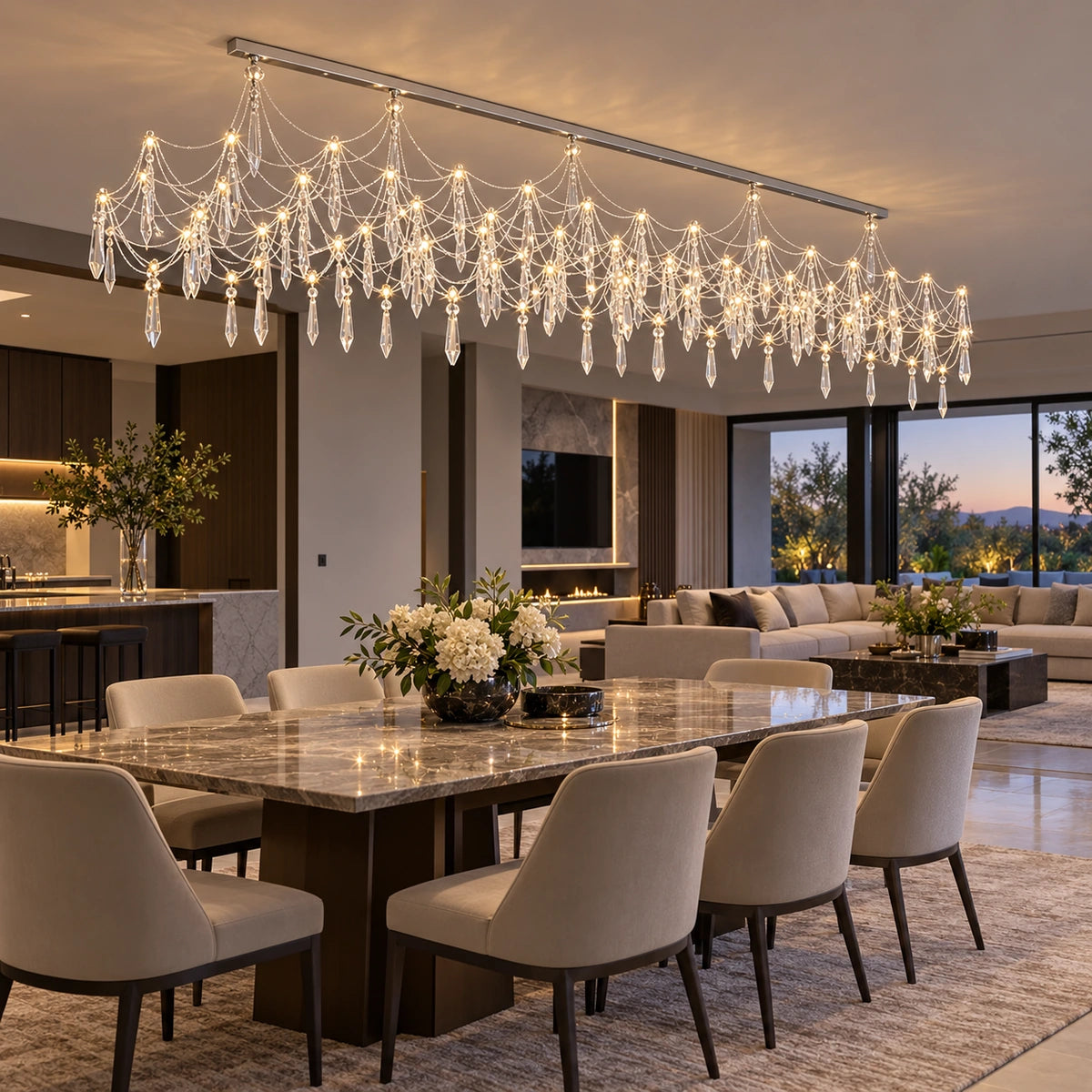 Chrome crystal draped chandelier above a dining table
