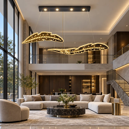 Twin-wave crystal chandelier above a dining table