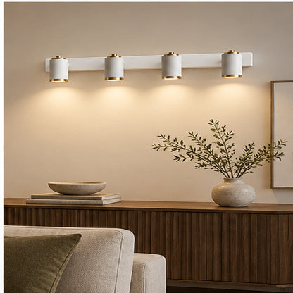 Four-light picture light in a gallery wall setting