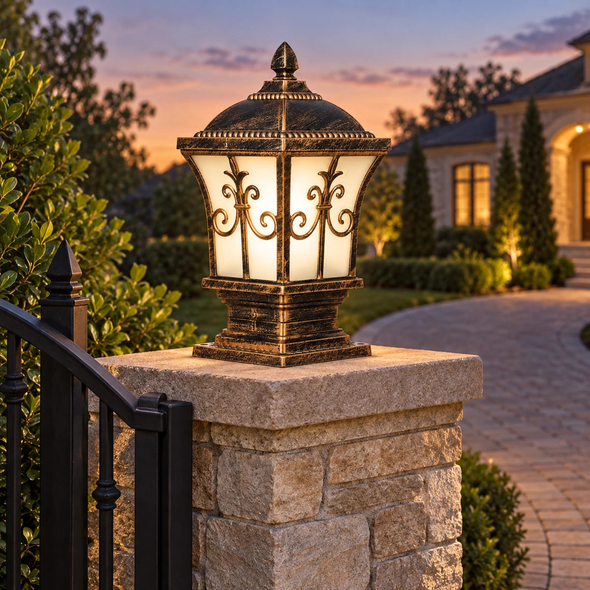 Pillar light marking a residential gate and driveway entrance