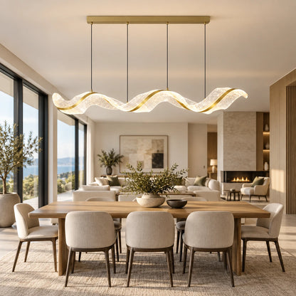 Sculptural wave LED chandelier in an open-plan dining space