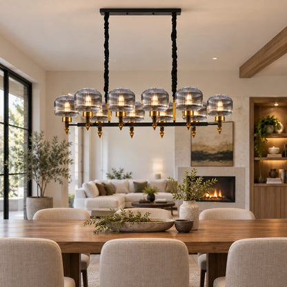Smoke-glass ten-light linear pendant in an open-plan dining room
