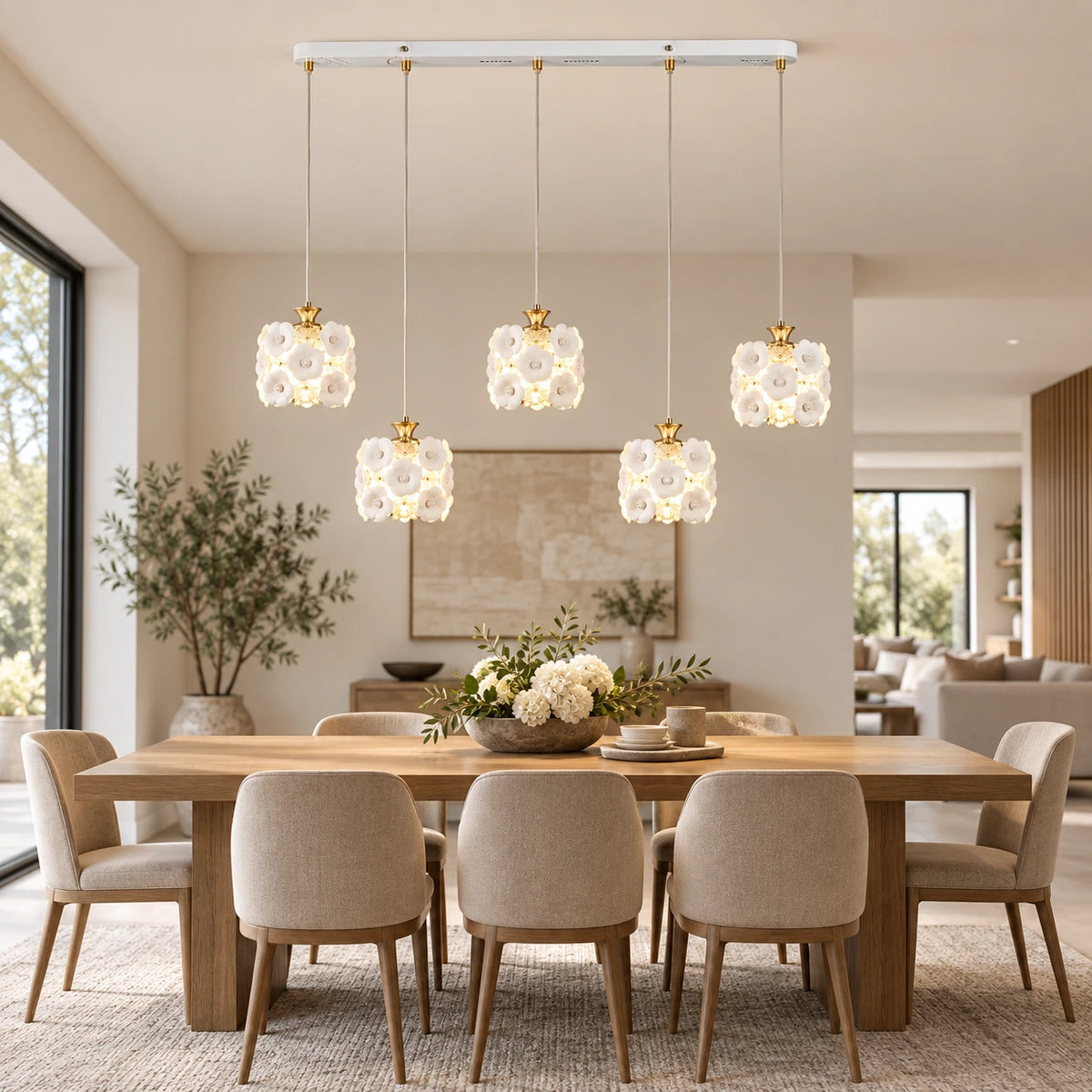 Floral ceramic five-shade pendant cluster in an open-plan dining room