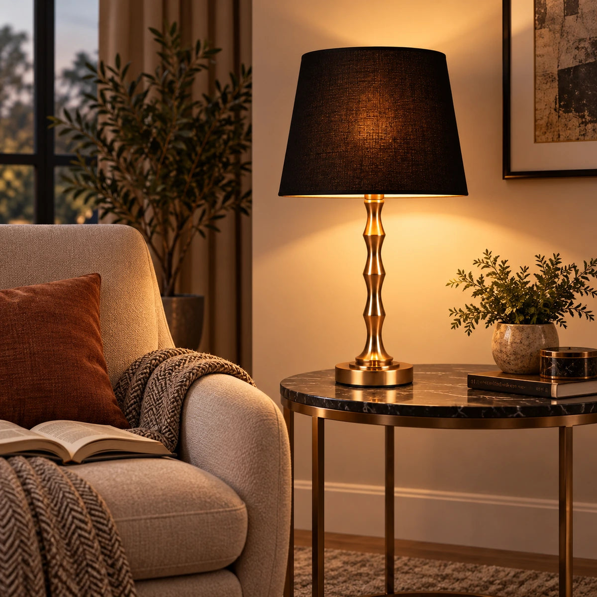 Black shade table lamp beside a lounge chair