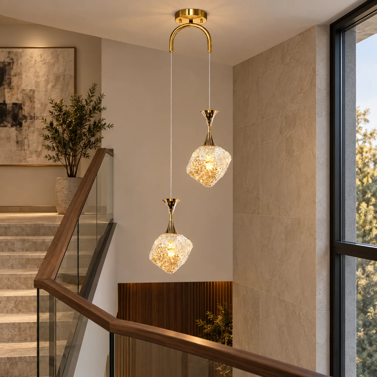 Textured-glass two-light pendant beside a staircase