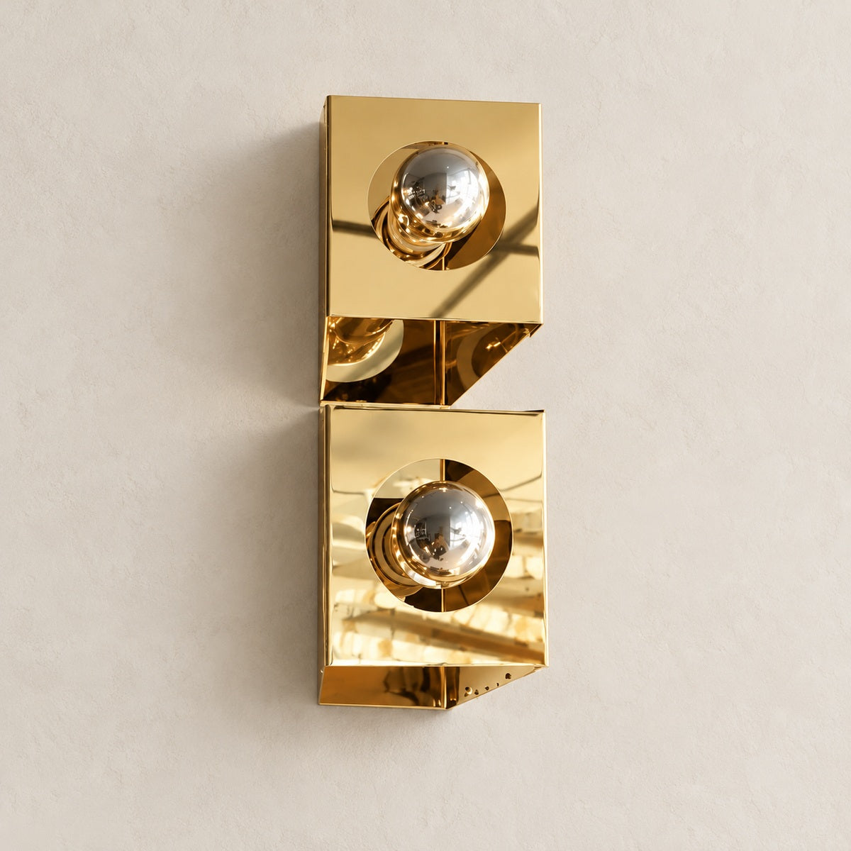 Sculptural twin-globe polished gold wall light, full product hero