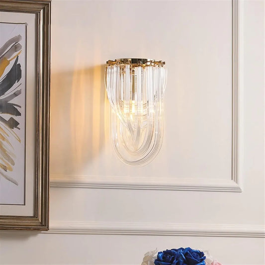Cascade Loop crystal wall sconce in a light interior