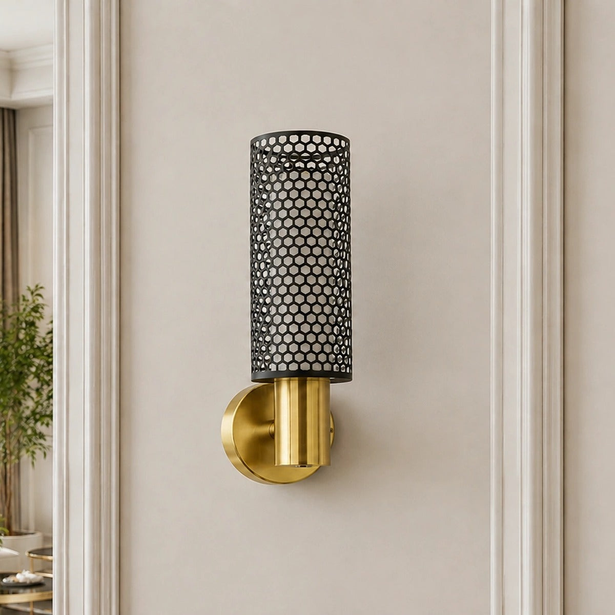 Square supplier-context view of the Vesper black honeycomb and brushed-gold LED wall light