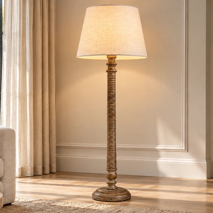 Lustrella bronze-brown ribbed column floor lamp in a bright living room