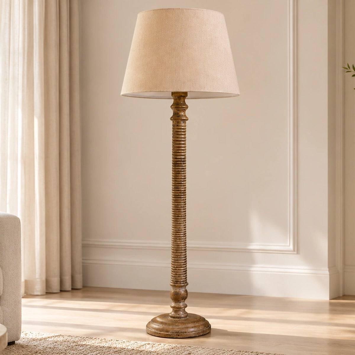 Lustrella bronze-brown ribbed column floor lamp illuminated in a second living-room view