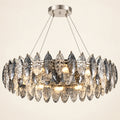 Oval crystal leaf chandelier on a clean studio background