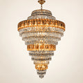 Tiered amber crystal chandelier on a clean studio background