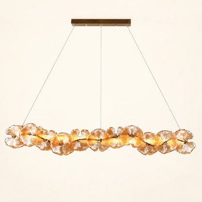 Floral glass linear pendant on a warm ivory background