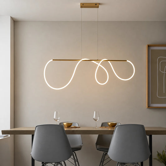 Looped ribbon linear pendant in a refined dining setting