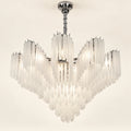 Frosted tiered chandelier on a warm ivory background