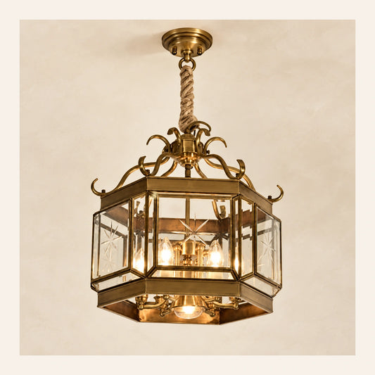 Ornate octagonal glass lantern pendant on a warm studio background