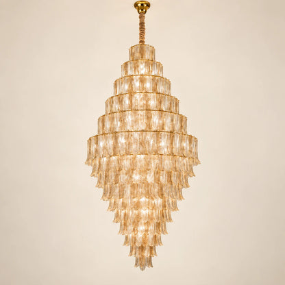 Tiered ribbed glass cascade chandelier on a clean studio background