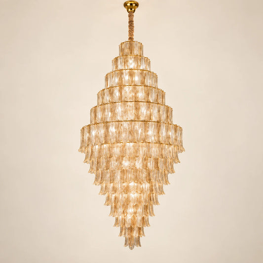 Tiered ribbed glass cascade chandelier on a clean studio background