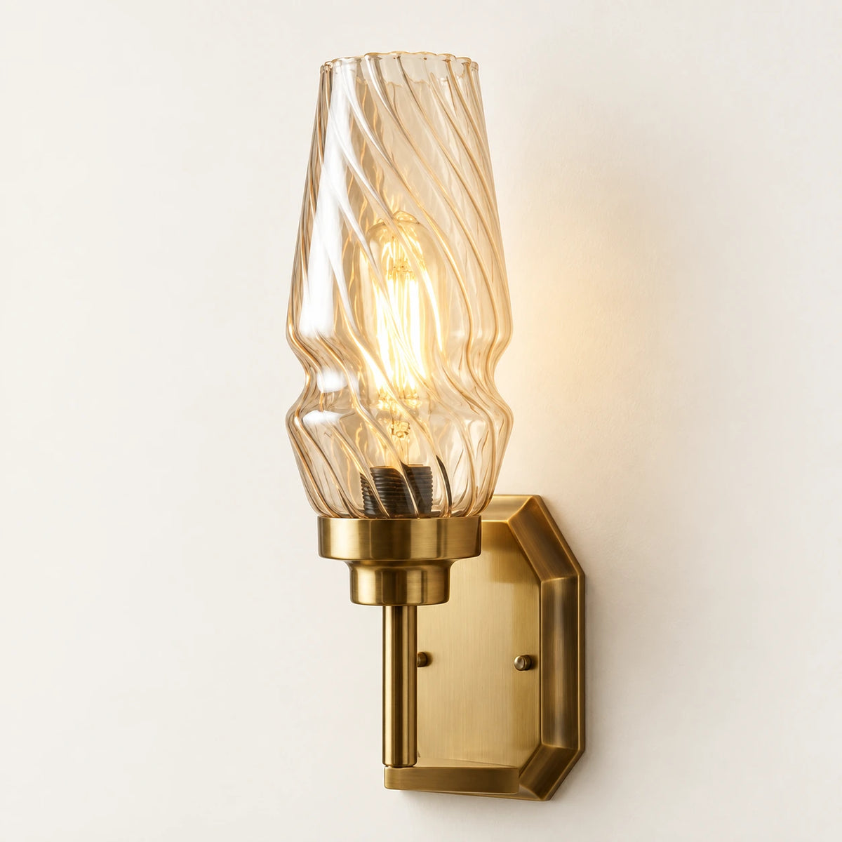 Sculpted ripple-shade wall sconce on a clean ivory background