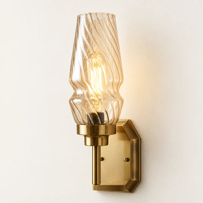 Sculpted ripple-shade wall sconce on a clean ivory background