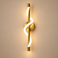 Twisted ribbon linear wall light on a warm neutral background