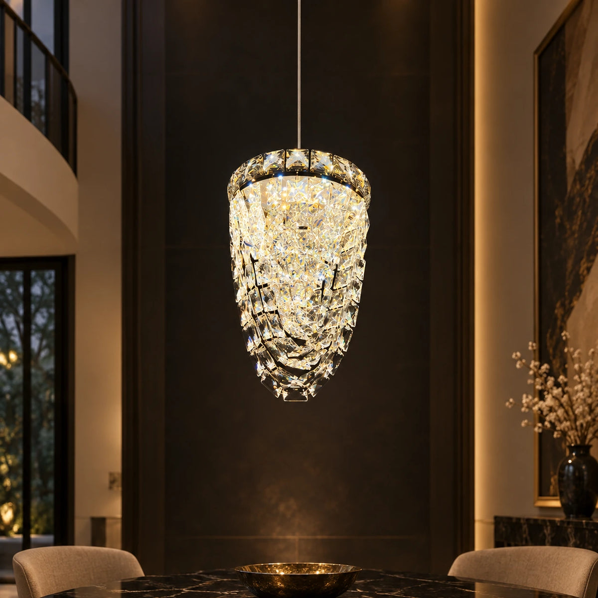 Single-drop faceted crystal pendant in a refined interior