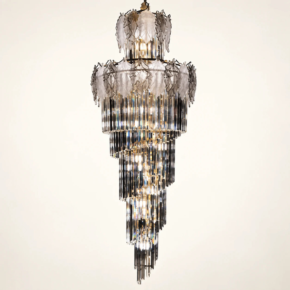 Tiered smoked glass crystal chandelier on a clean studio background