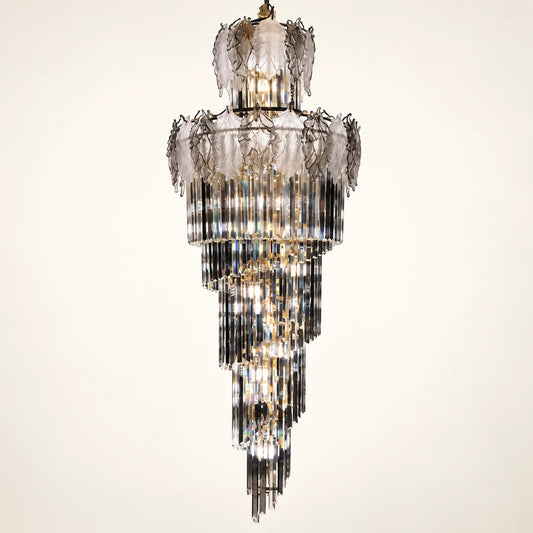 Tiered smoked glass crystal chandelier on a clean studio background