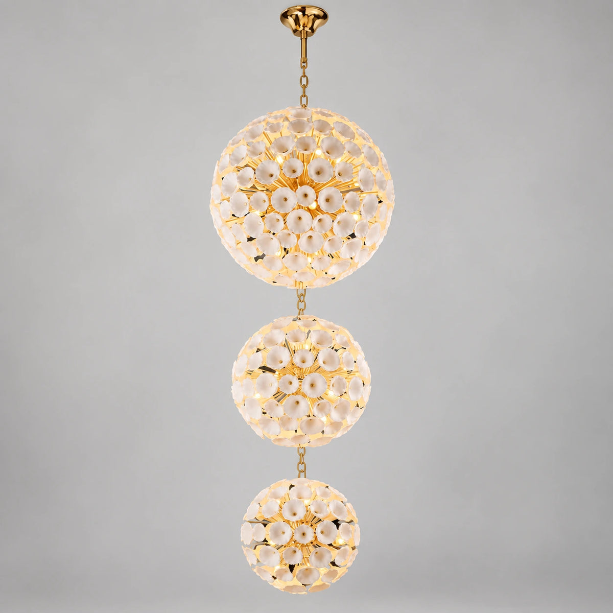 Three-tier ceramic flower chandelier on a neutral studio background