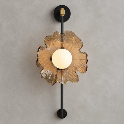 Textured petal globe wall sconce on a clean studio background