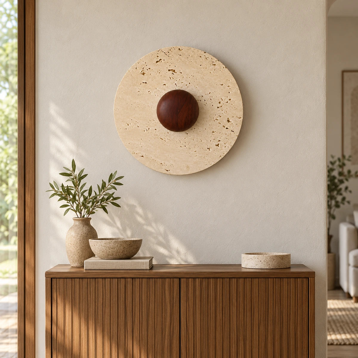 Travertine Orbis Plain wall lamp above a console — illustrative styled scene; room scale unverified