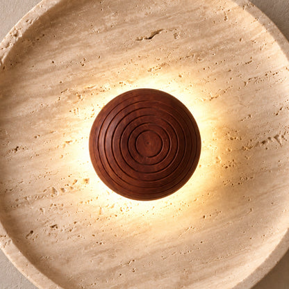 Travis Curv grooved Sheesham centre and porous travertine dish — illustrative detail