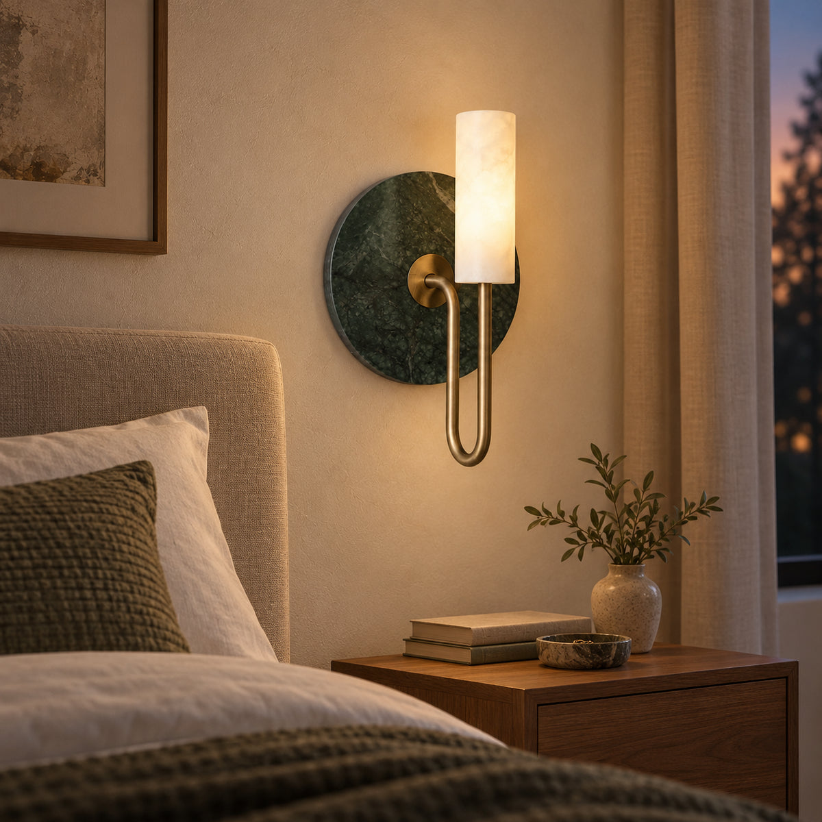 Vesta green marble wall light, generated bedside lifestyle view with white translucent stone cylinder and brass-tone U-arm